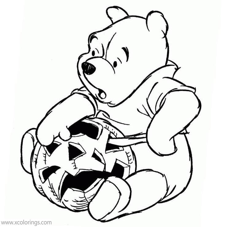 Free Winnie the Pooh Halloween Coloring Pages Winnie is Cutting a Pumpkin printable
